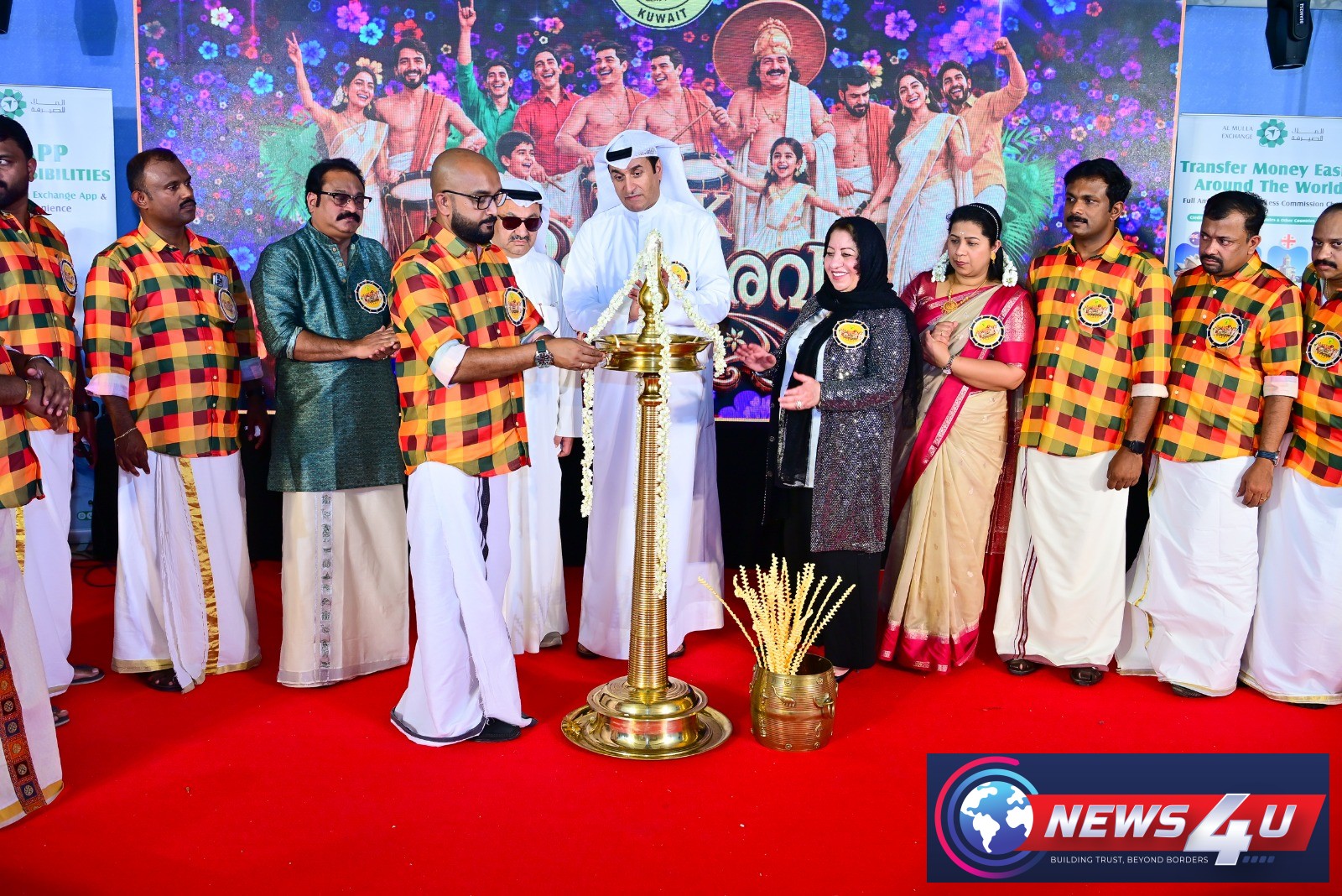 ഐ.എ.കെ. പ്രസിഡന്റ് അനീഷ് പ്രഭാകരന്‍ തിരി തെളിയിക്കുന്നു
